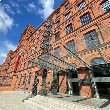 Regent Warsaw Hotel exterior with green surroundings